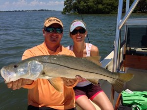 Mindy with her snook caught in the waters of Tampa Bay, Florida. 